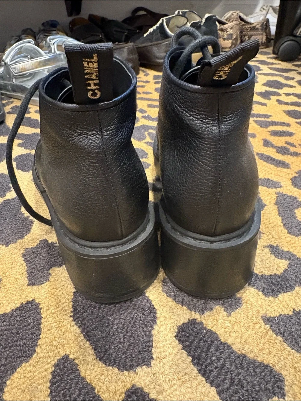 CHANEL Pebbled Leather CC Ankle Boots